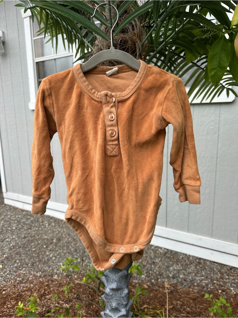 kate quinn Long-Sleeve One-Piece Bodysuit in Gold
